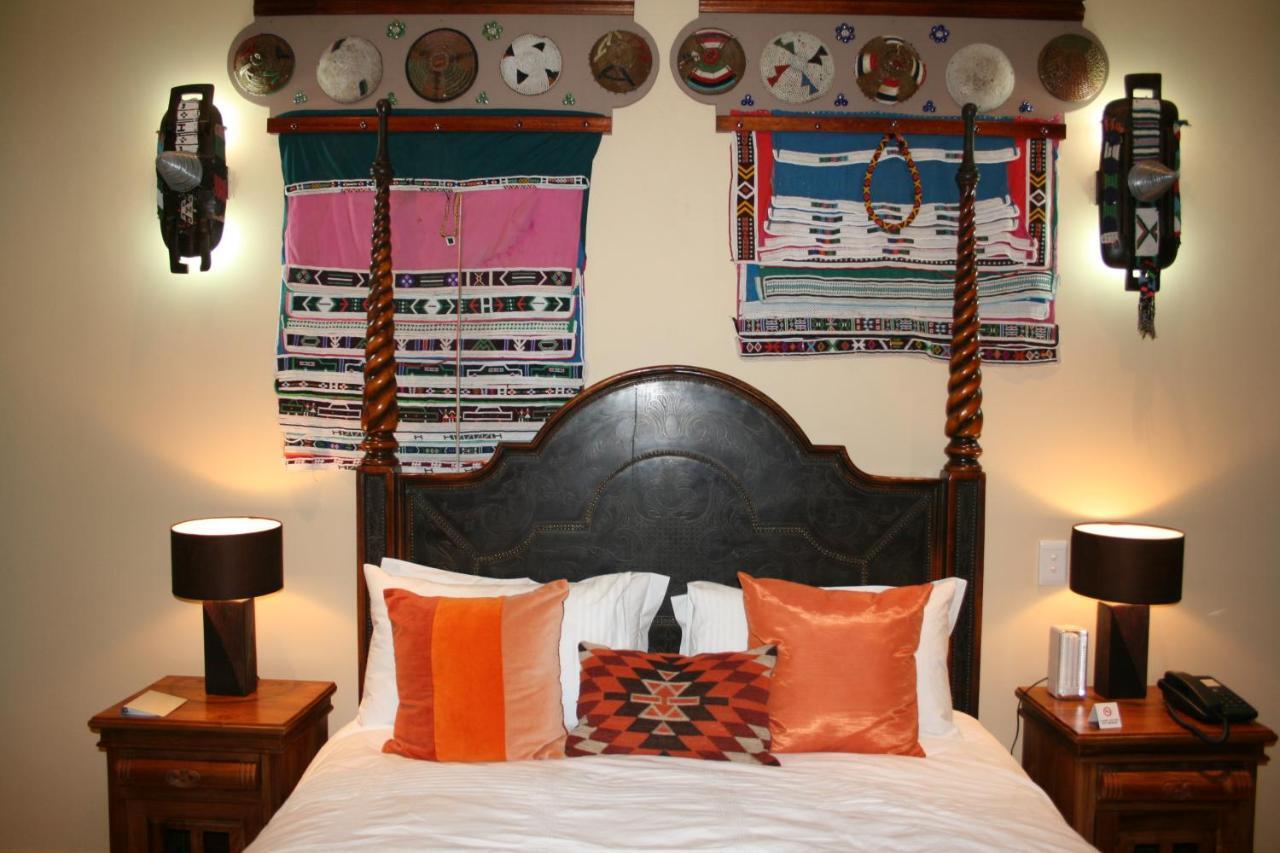 Ammazulu African Palace Kloof Bilik gambar